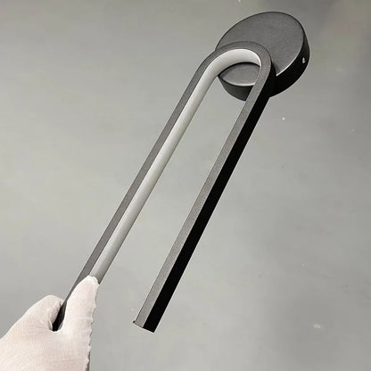 Minimalist Black LED Bedside Wall Sconce