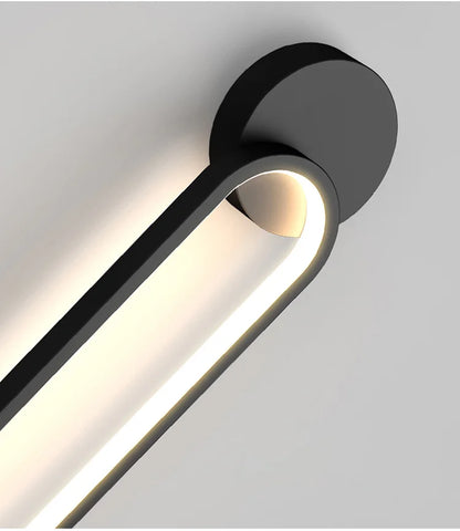 Minimalist Black LED Bedside Wall Sconce